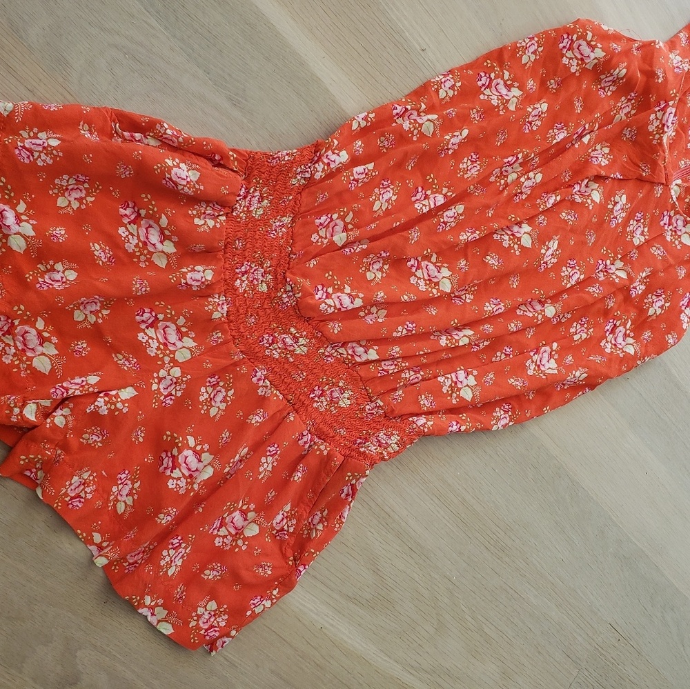 Orange floral romprr